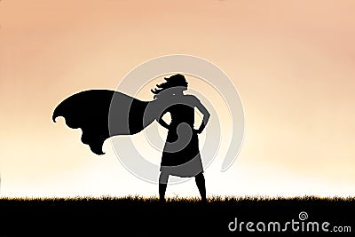 Strong Beautiful Caped Super Hero Woman Silhouette Isolated Against Sunset Sky Background Stock Photo