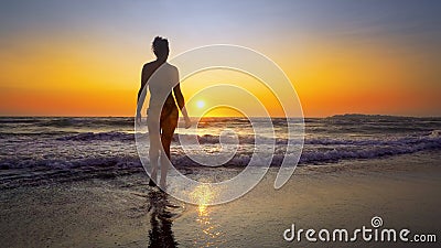 Silhouette strong confidence woman open arms under the sunrise Stock Photo