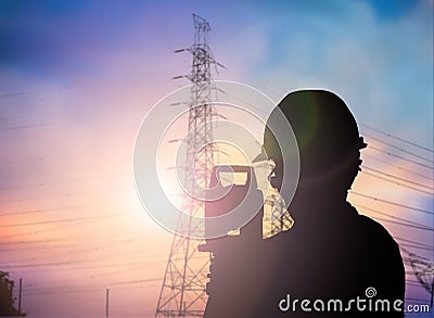 Silhouette Successful male engineer standing survey work on cons Stock Photo