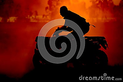 Silhouette summer offroad adventure on atv in sand Stock Photo