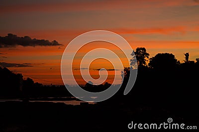 Silhouette of sunset at Mekong Mae Nam Khong River Stock Photo