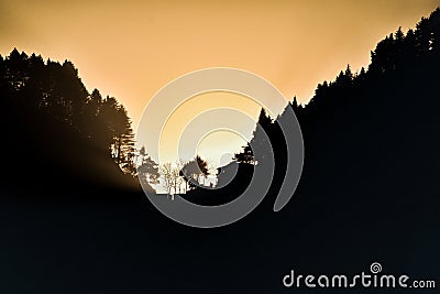 silhouette before sunsets from mountains Stock Photo