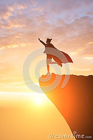 Super business woman on mountain Stock Photo