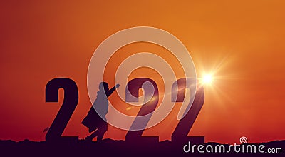 silhouette of a superhero rushes forward with determination and determination. jogging with sun in the background, silhouette Stock Photo