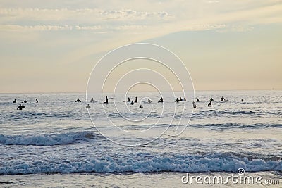 Silhouette Of surfer people on sunset beach catch oceans wave.Surfing sport and travel concept Editorial Stock Photo