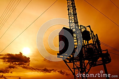 Silhouette telecommunication pole Stock Photo