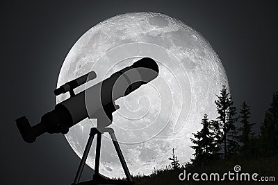 Silhouette of telescope and big moon in background. Astronomy and exploration of universe concept. Stock Photo