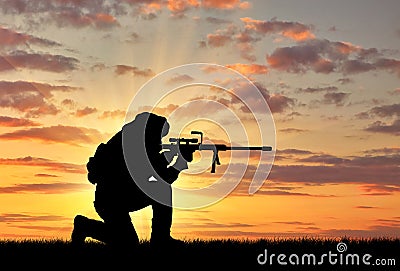 Silhouette of a terrorist with a rifle Stock Photo