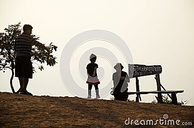 Silhouette of thai family people travel on top of Phu Pa Po mountain or Fuji City Loei Editorial Stock Photo