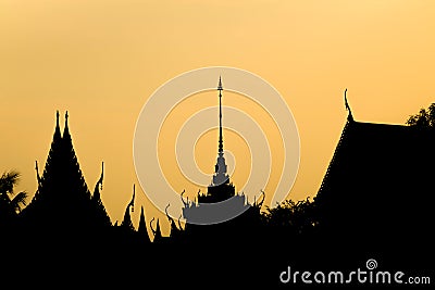 Silhouette Thai temple in sunset light Stock Photo