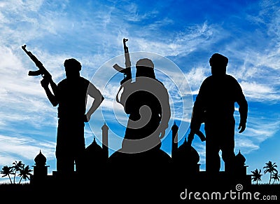 Silhouette of three terrorists Stock Photo