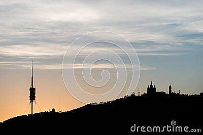 Silhouette of Tibidabo hill at the sunset in Barcelona city. Spain Stock Photo