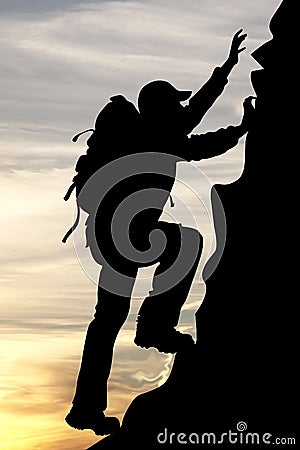 Silhouette of a traveler tourist mountaineer Stock Photo