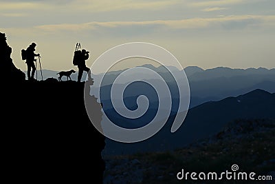 Mountain hikers silhouette Stock Photo