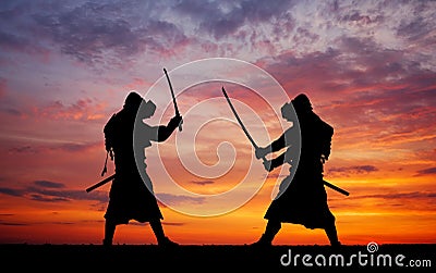 Silhouette of two samurais in duel. Stock Photo