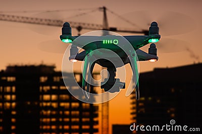 Silhouette of Unmanned Aircraft System UAV Quadcopter Drone Stock Photo