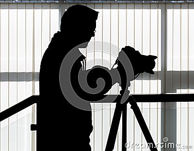 Silhouette of video and photographic equipment Stock Photo