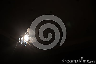 Silhouette Wheelchair back the scene white and blur spotlight at theater for movie film and video . Stock Photo