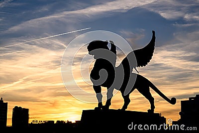 Silhouette of winged leopard statue at Wedding palace (Family center) at sunset, Kazan, Tatarstan, Russia Editorial Stock Photo