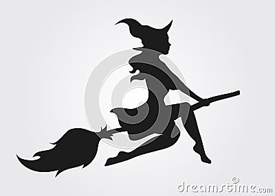 Silhouette of a witch flying on a broomstick Stock Photo