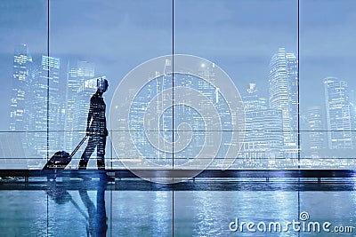 Silhouette of woman in airport Stock Photo