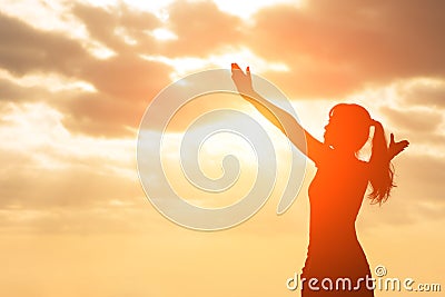 Silhouette of woman pray Stock Photo