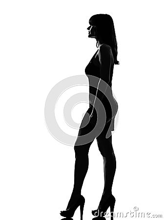 Silhouette woman standing profile full length Stock Photo