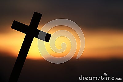 Silhouette of a Wooden Cross Stock Photo