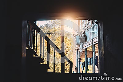 Silhouette of a wooden staircase in an old house Stock Photo