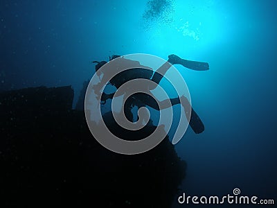 Silhouette wreck diver Stock Photo