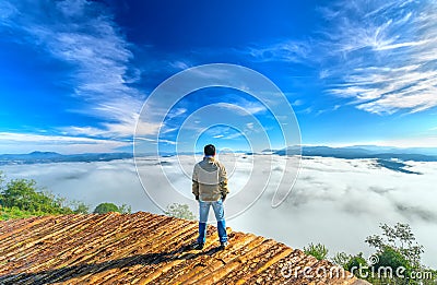 Silhouette young man standing on a high hill scenic rural hometown Editorial Stock Photo