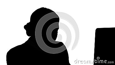 Silhouette Young Office Woman Talking to Someone on her Mobile Phone. Stock Photo