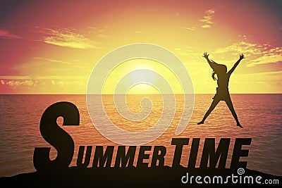 Silhouette young woman jumping and raising up her hand about happy concept on SUMMER TIME text Stock Photo