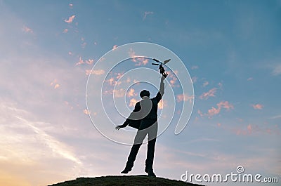 Silhouetted a monument to aircraft designer Sikorsky on the background the evening sky Editorial Stock Photo