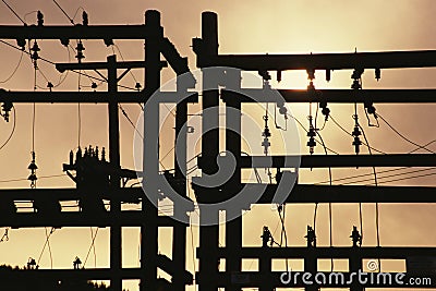 Silhouetted power lines Stock Photo