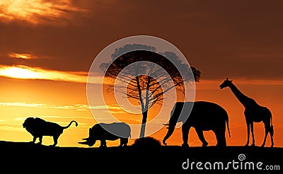 Silhouettes of African animals at sunset in the Savannah Stock Photo