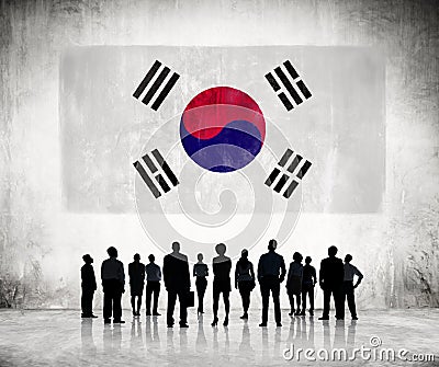 Silhouettes of Business People Looking at the South Korean Flag Stock Photo