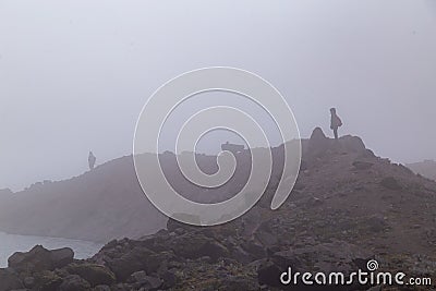 Silhouettes of climbers Stock Photo