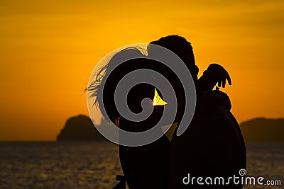 Silhouettes of couples in love Stock Photo