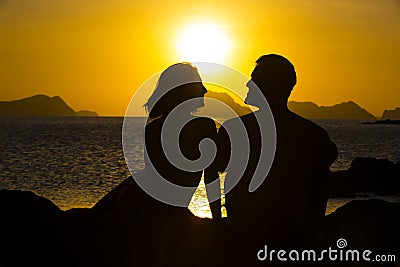 Silhouettes of couples in love Stock Photo