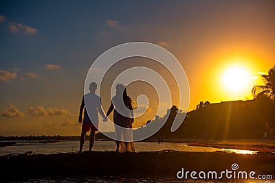 Silhouettes of men and women against the backdrop Editorial Stock Photo