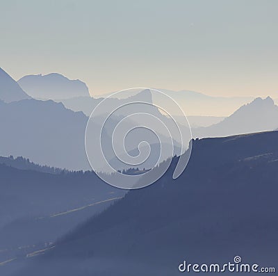 Silhouettes of Mount Wiriehore and other mountains in the Bernese Oberland. View from Mount Niesen direction southwest. Stock Photo