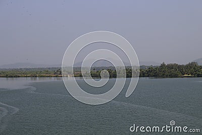 Silhouettes of mountains and lake Stock Photo