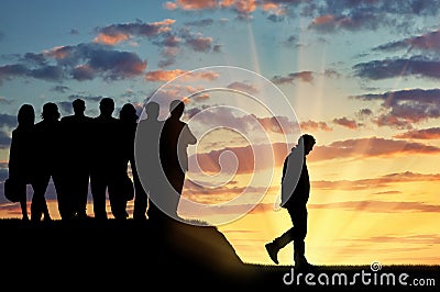 Silhouettes of people crowd expel the man from their community. Stock Photo