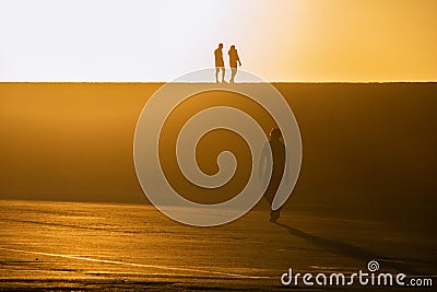Silhouettes at sunset, Stock Photo
