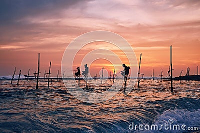 Traditional stilt fishing in Sri Lanka Stock Photo