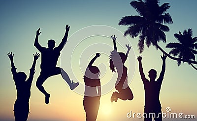 Silhouettes of Young People Jumping with Excitement Stock Photo