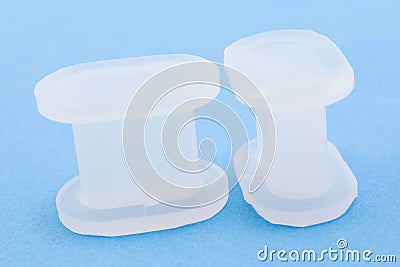 Silicon separators bunions on a blue background Stock Photo