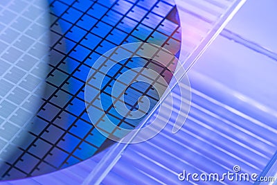 Silicon Wafer with microchips used in electronics Stock Photo