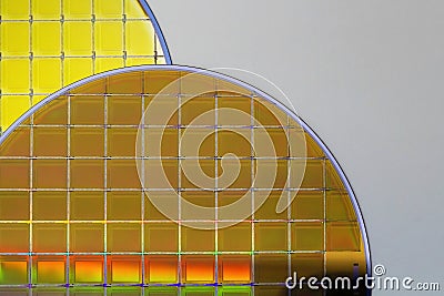 Silicon Wafers and Microcircuits - A wafer is a thin slice of semiconductor material, such as a crystalline silicon, used in Stock Photo